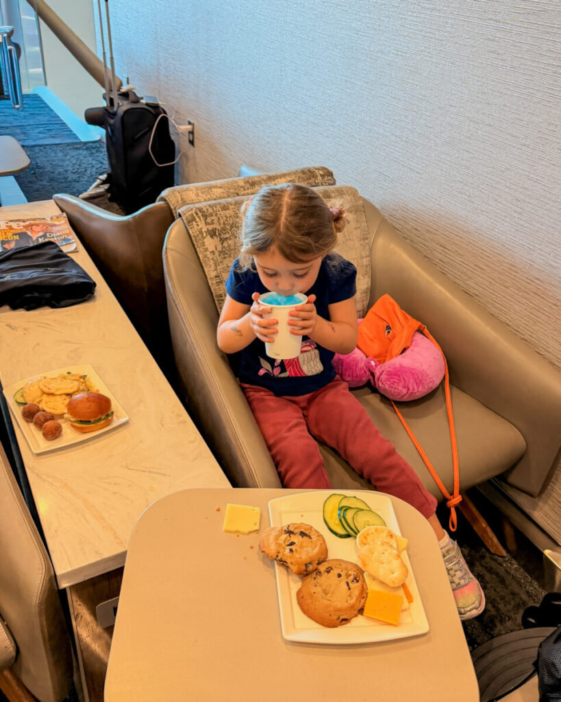 little girl in airport lounge 